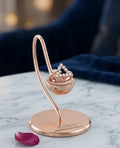 Triangular shaped ring